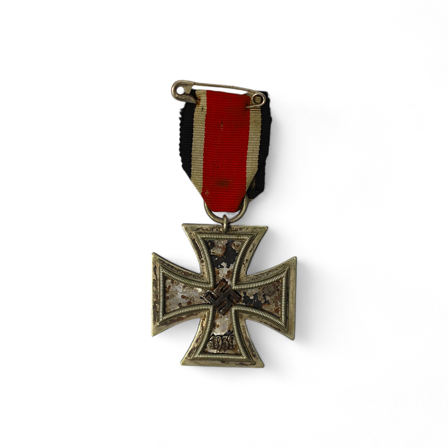 A WWII Iron Cross. Condition - poor, black paint now mainly missing from surface.